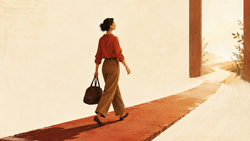A woman carries a bag along a red path toward an open doorway, symbolizing how to quit a job you just started and move on professionally.